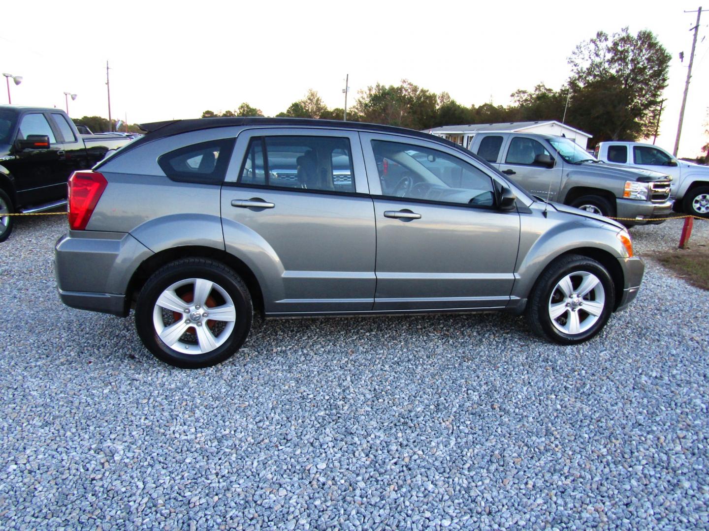 2011 Gray /Gray Dodge Caliber (1B3CB3HA4BD) with an 4 CYL engine, Automatic transmission, located at 15016 S Hwy 231, Midland City, AL, 36350, (334) 983-3001, 31.306210, -85.495277 - Photo#3